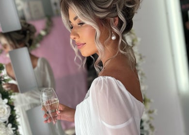 Elegant woman with styled hair at Be You Tiful Hair And Beauty 01792 417957, Swansea, Wales, GB.