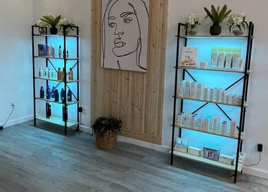Elegant product shelves at Elite Esthetics by Dalal in Lodi, California, US showcasing beauty items.