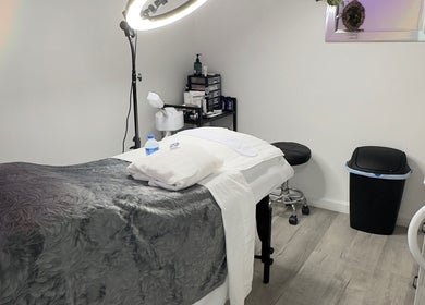 Relaxing treatment room at Elite Esthetics by Dalal in Lodi, California, US with cozy spa decor.