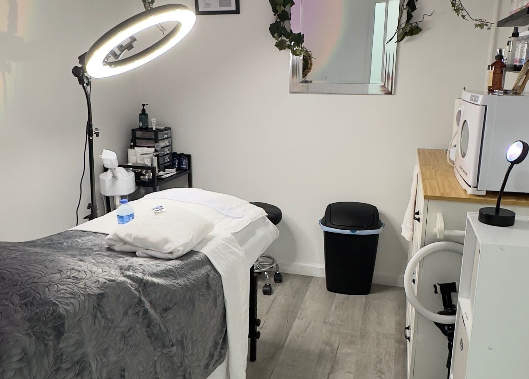 Elite Esthetics by Dalal spa room in Lodi, California, US with cozy massage table and soothing decor.
