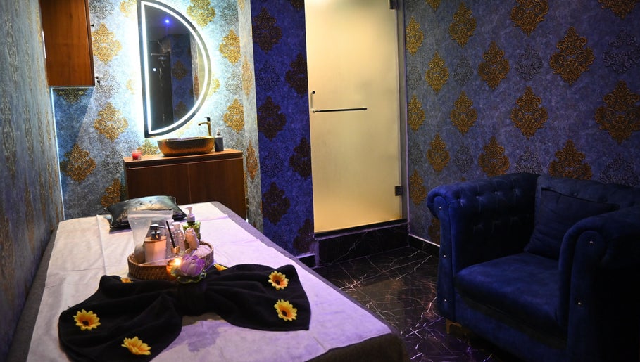 Luxurious spa room at Refresh D Thai Spa with elegant decor in Bengaluru, Karnataka, IN.
