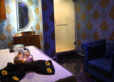 Luxurious spa room at Refresh D Thai Spa with elegant decor in Bengaluru, Karnataka, IN.