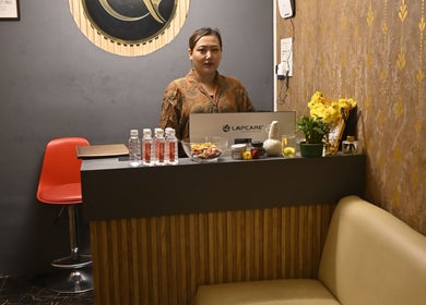 Reception area at Refresh D Thai Spa, Bengaluru, Karnataka, IN, featuring elegant decor and a welcoming ambiance.