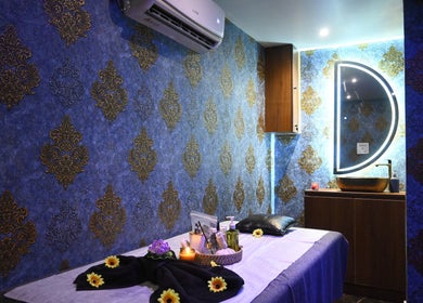 Luxurious massage room at Refresh D Thai Spa, Bengaluru, Karnataka, IN with elegant decor and soothing ambiance.