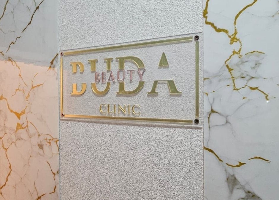 Buda Beauty's elegant signage on marble wall in Shildon, England, GB.