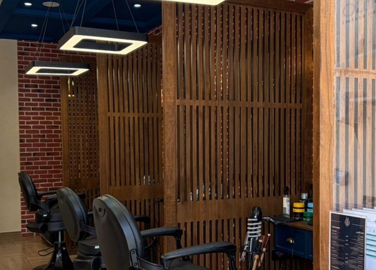 Stylish barber chairs at Dye Hard Barbers in Riyadh, Riyadh Province, SA, showcasing a modern barber setup.