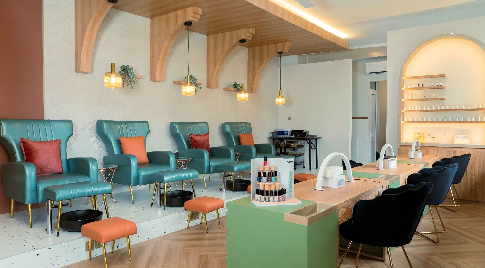 Elegant interior of Nails Haven Bali, Bali, ID showcasing luxury manicure stations and pedicure chairs.