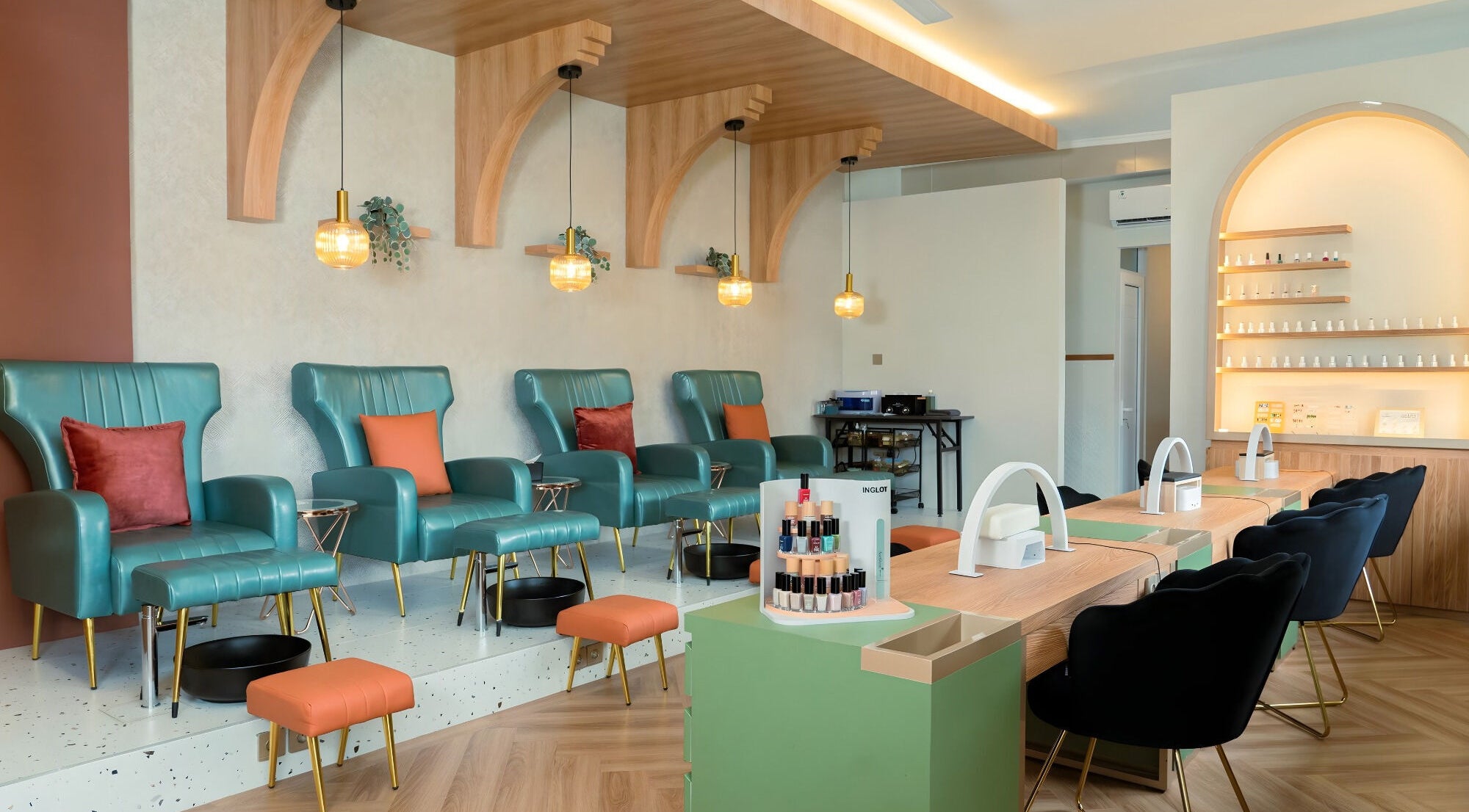 Elegant interior of Nails Haven Bali, Bali, ID showcasing luxury manicure stations and pedicure chairs.