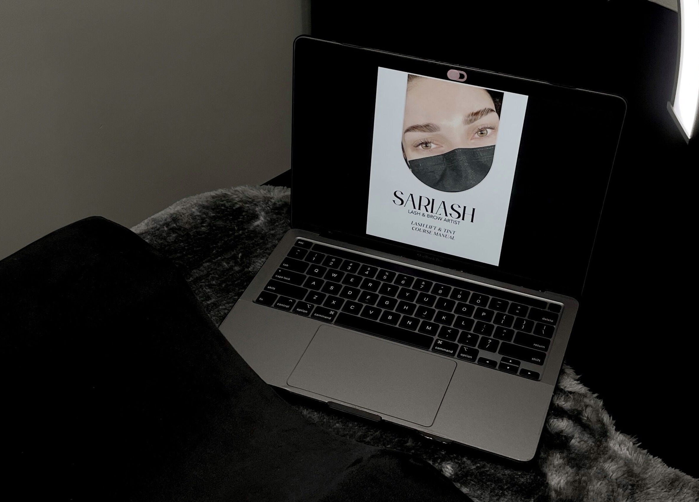 Sarlash KL laptop setup at Kuala Lumpur, Wilayah Persekutuan Kuala Lumpur, MY, featuring beauty course materials.