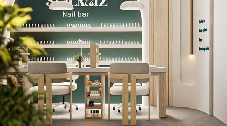 Solmaz spa and beauty center's elegant nail bar in Seeb, Muscat Governorate, OM with modern decor and nail polish display.