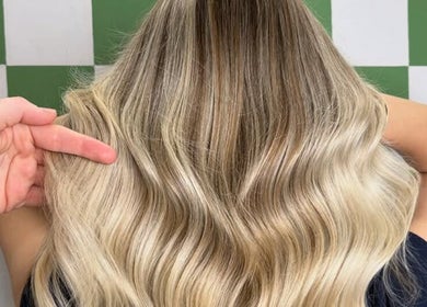 Blonde wavy hairstyle at Glen Alpine Beauty Hub, Glen Alpine, New South Wales, AU.