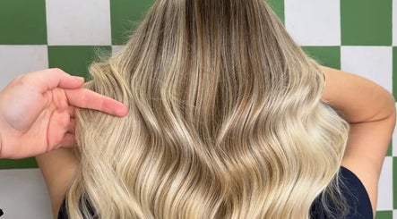 Blonde wavy hairstyle at Glen Alpine Beauty Hub, Glen Alpine, New South Wales, AU.