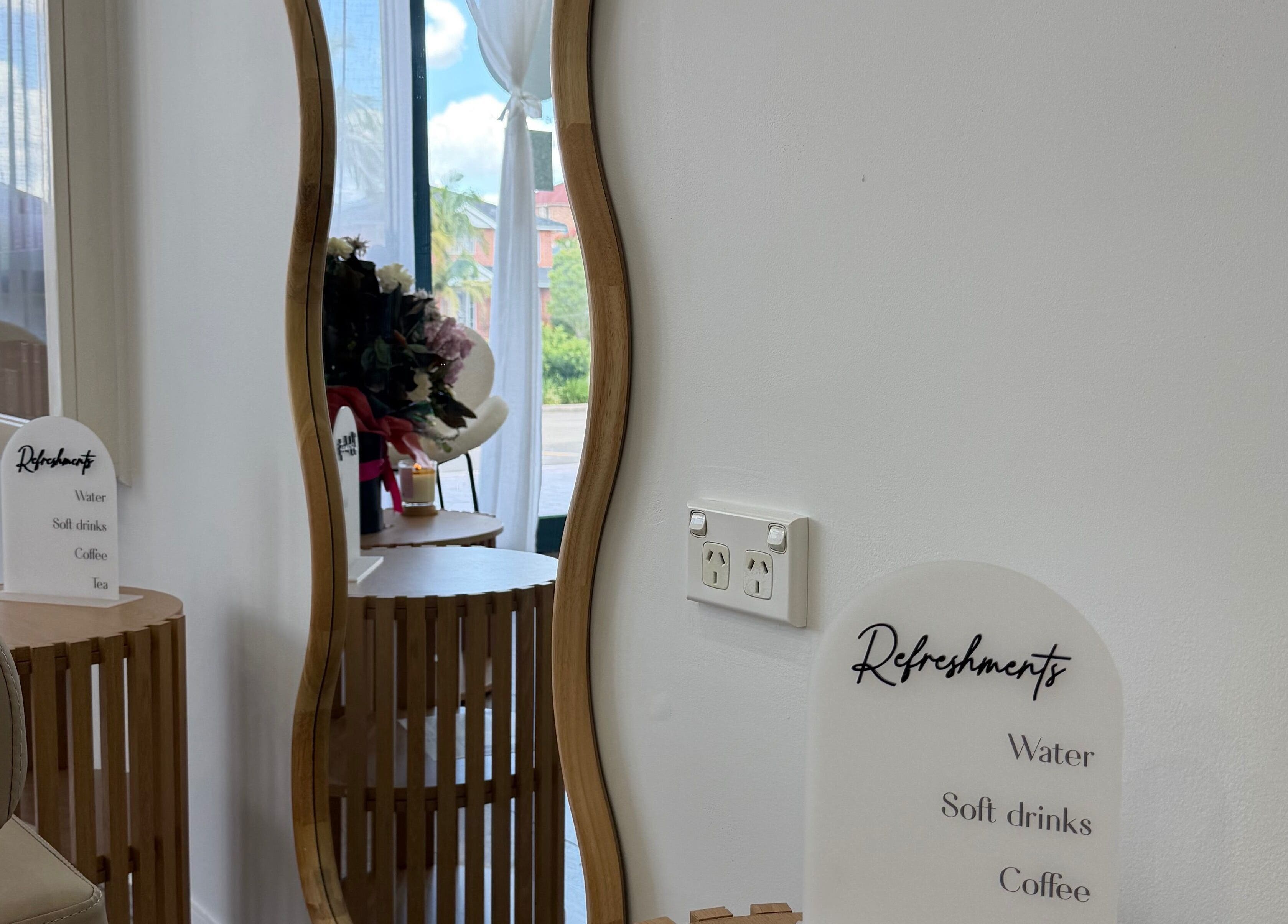 Elegant mirror and refreshment sign at Heavenly Strands, Glen Alpine, New South Wales, AU.