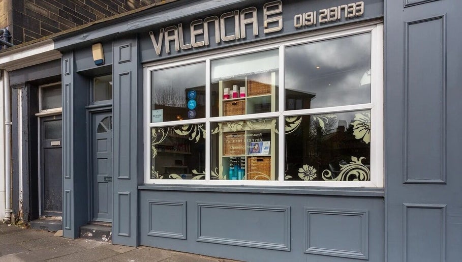 Elegant exterior of Valencia Salon, Newcastle upon Tyne, England, GB with stylish signage.