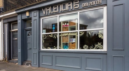 Elegant exterior of Valencia Salon, Newcastle upon Tyne, England, GB with stylish signage.