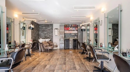 Valencia Salon's stylish interior in Newcastle upon Tyne, England, GB, showcasing modern chairs and sleek decor.
