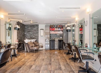 Valencia Salon interior in Newcastle upon Tyne, England, GB with modern chairs and mirrors.