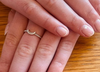 Freshly manicured hands with crescent ring at MJM Beauty Studio, Shrewsbury, England, GB.