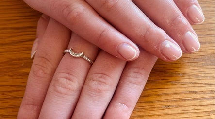 Freshly manicured hands with crescent ring at MJM Beauty Studio, Shrewsbury, England, GB.