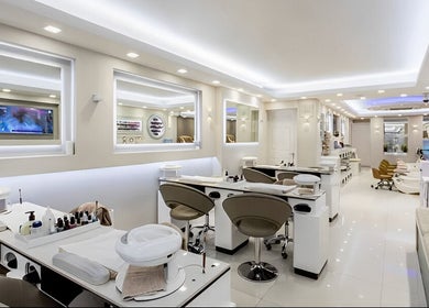 Modern interior of USA STAR NAILS CLAPHAM SOUTH salon in London, England, GB featuring elegant nail stations.