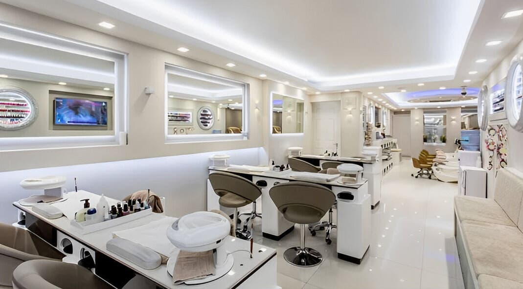 Modern interior of USA STAR NAILS CLAPHAM SOUTH salon in London, England, GB featuring elegant nail stations.