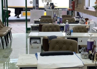 Interior of USA STAR NAILS CLAPHAM SOUTH in London, England, GB with stylish nail stations.