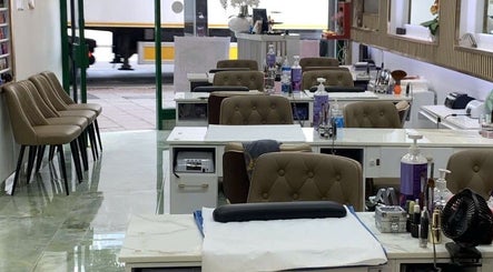Interior of USA STAR NAILS CLAPHAM SOUTH in London, England, GB with stylish nail stations.