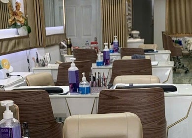 Chic nail salon interior at USA STAR NAILS CLAPHAM SOUTH, London, England, GB featuring modern workstations.