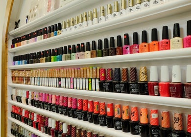 Colorful nail polish display at USA STAR NAILS CLAPHAM SOUTH, London, England, GB.