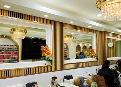 Elegant interior of USA STAR NAILS CLAPHAM SOUTH in London, England, GB, featuring chic decor and manicure stations.
