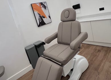 Comfortable treatment chair at Zehra Zem Aesthetics, London, England, GB, offers relaxing wellness services.