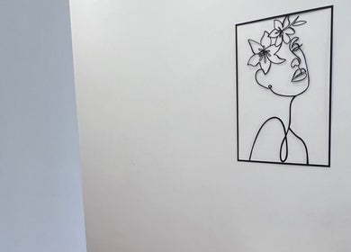 Minimalist artwork on a wall at Zehra Zem Aesthetics, London, England, GB, enhancing the tranquil ambiance.