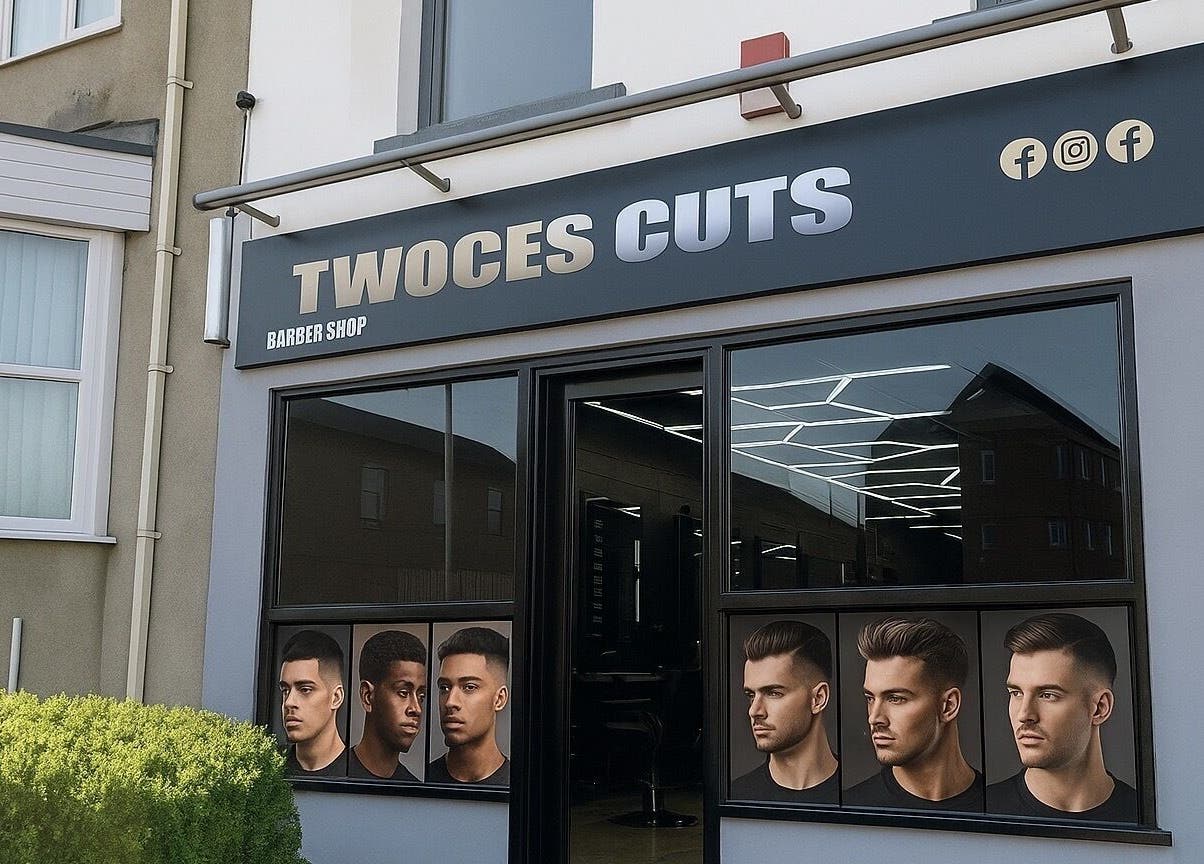 Front view of Twocees Cuts barbershop in Stoke-on-Trent, England, GB with stylish signage and window graphics.