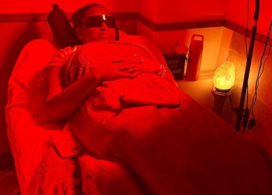 Relaxing red light therapy session at Cynergi Healing Center, Worcester, Massachusetts, US.