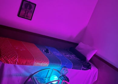 Tranquil therapy room with vibrant lighting at Cynergi Healing Center, Worcester, Massachusetts, US.