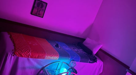 Tranquil therapy room with vibrant lighting at Cynergi Healing Center, Worcester, Massachusetts, US.