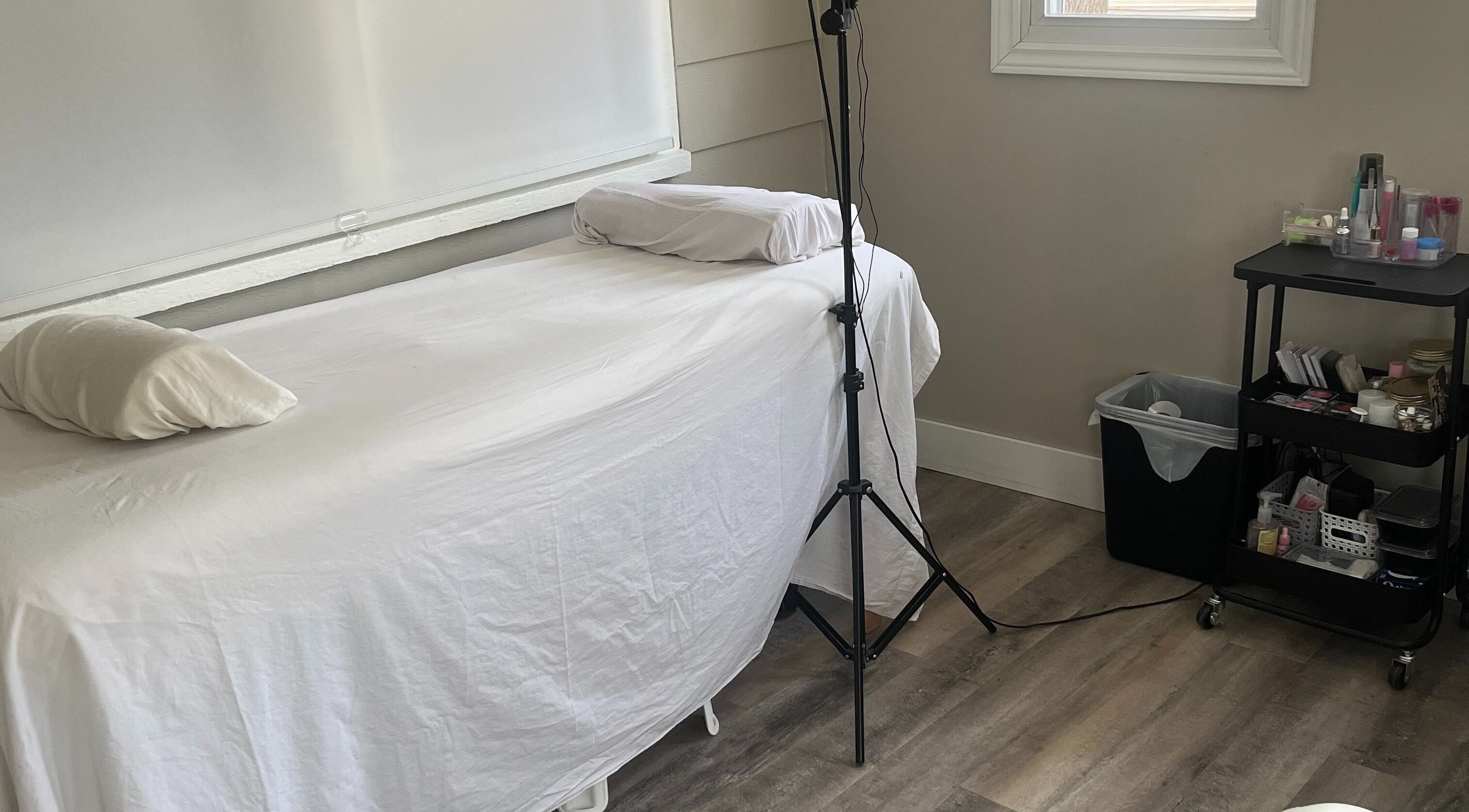 Tranquil treatment room at The Wright Aesthetic Nurse, Strathroy, Ontario, CA, featuring a well-prepared bed.
