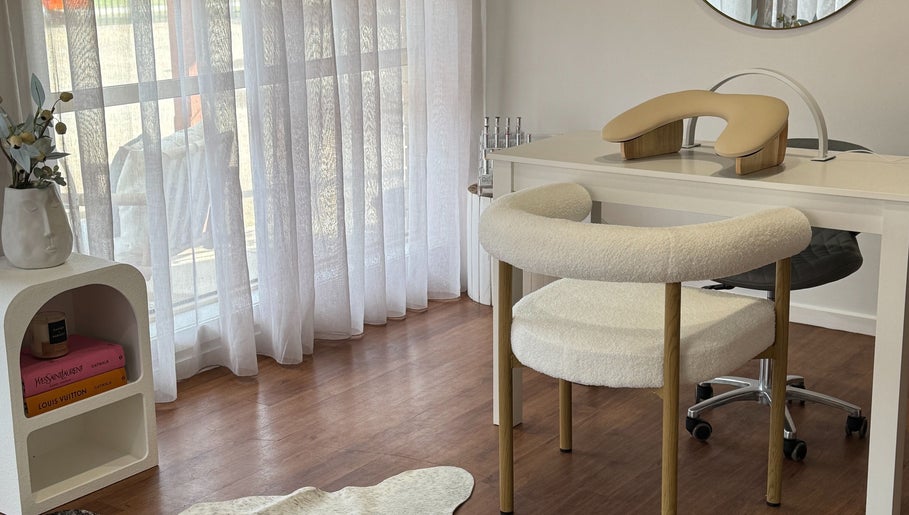 Elegant nail station at The Nail Station, Porepunkah, Victoria, AU with wooden chair and decor.