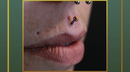 Close-up of nostril piercing at Gilded Touch Piercings, Glasgow, Scotland, GB showcasing precision and style.