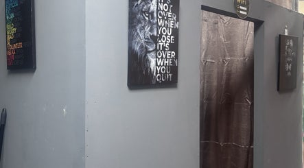 Motivational wall art at Royal Warriors Barbershop, San Fernando, Princes Town Regional Corporation, TT.
