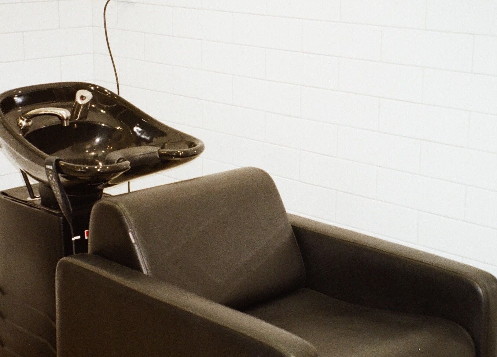 Elegant hair wash station at Tokoya Barber and Salon, Auckland, Auckland, NZ, offering premium hair services.