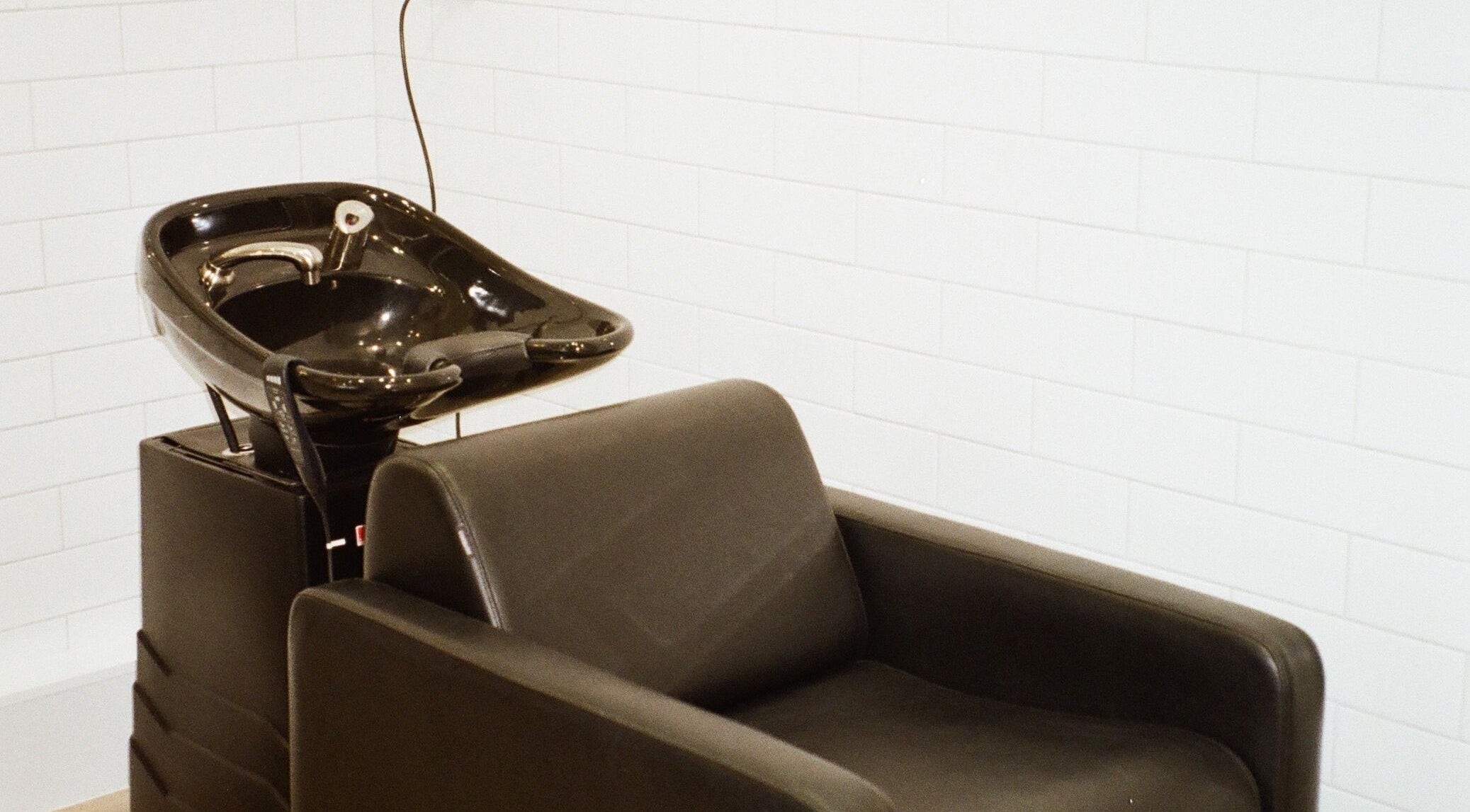 Elegant hair wash station at Tokoya Barber and Salon, Auckland, Auckland, NZ, offering premium hair services.