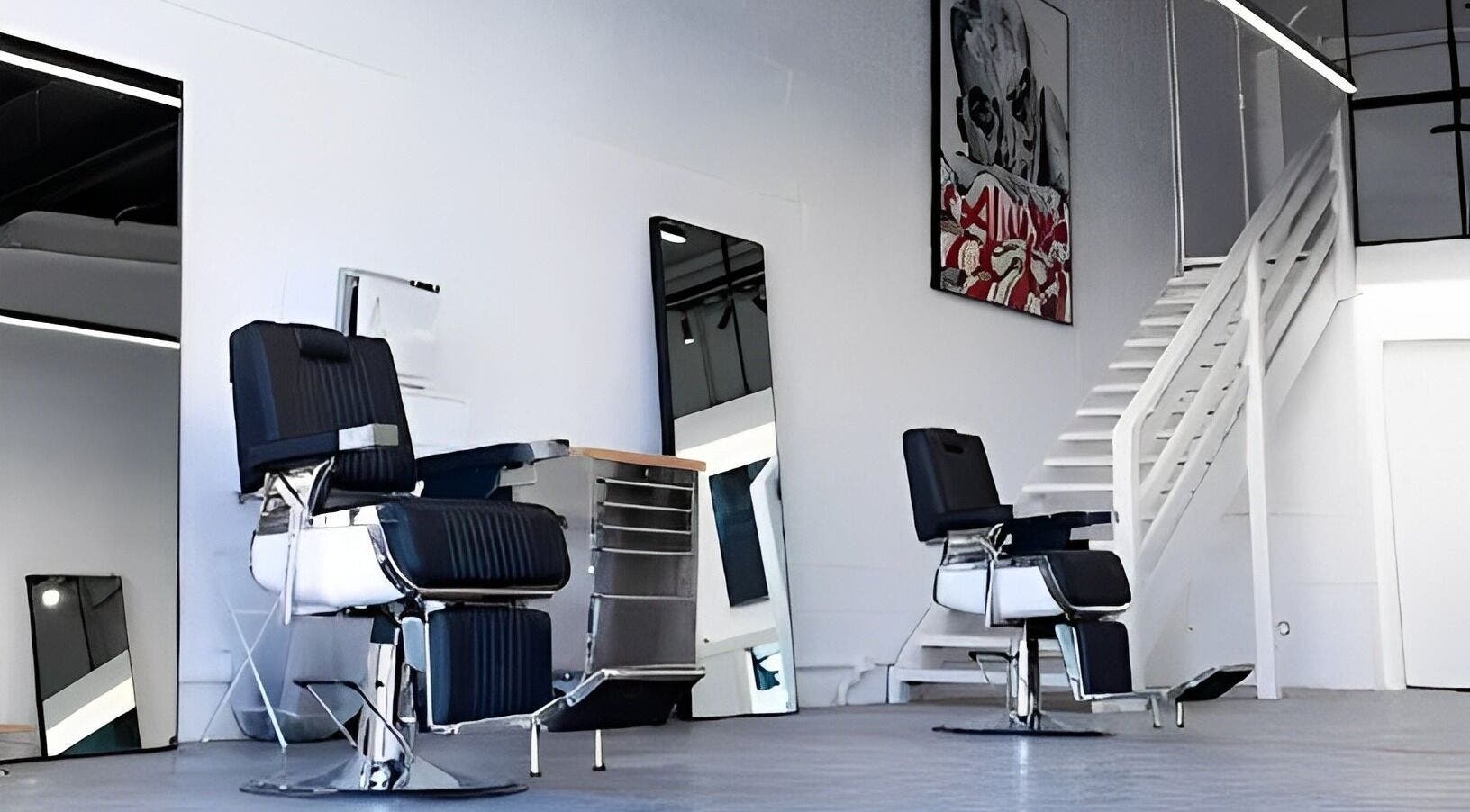 Stylish barber chairs at Seven&One Studio, Bundall, Queensland, AU showcasing modern aesthetic.