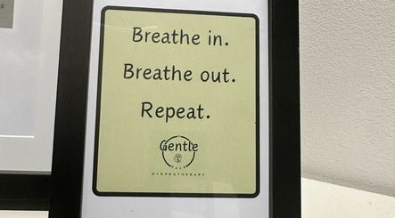 Framed motivational sign at A Gentle Pace Hypnotherapy, Newcastle upon Tyne, England, GB reads 'Breathe in, out'.