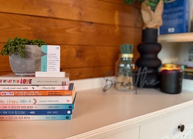 A calming shelf with books and plants at A Gentle Pace Hypnotherapy, Newcastle upon Tyne, England, GB.