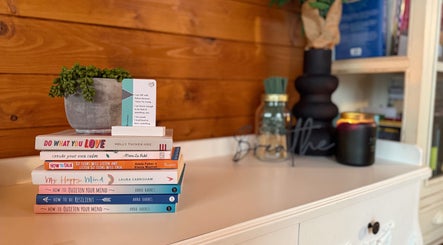 A calming shelf with books and plants at A Gentle Pace Hypnotherapy, Newcastle upon Tyne, England, GB.