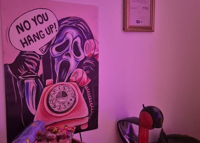 Creative wall art at Roxystudio Nails, London, England, GB, enhances a vibrant ambiance.