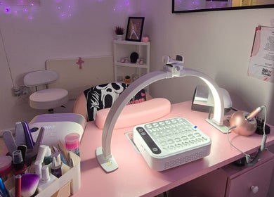 Nail workstation at Roxystudio Nails, London, England, GB, featuring tools and a comfortable chair.