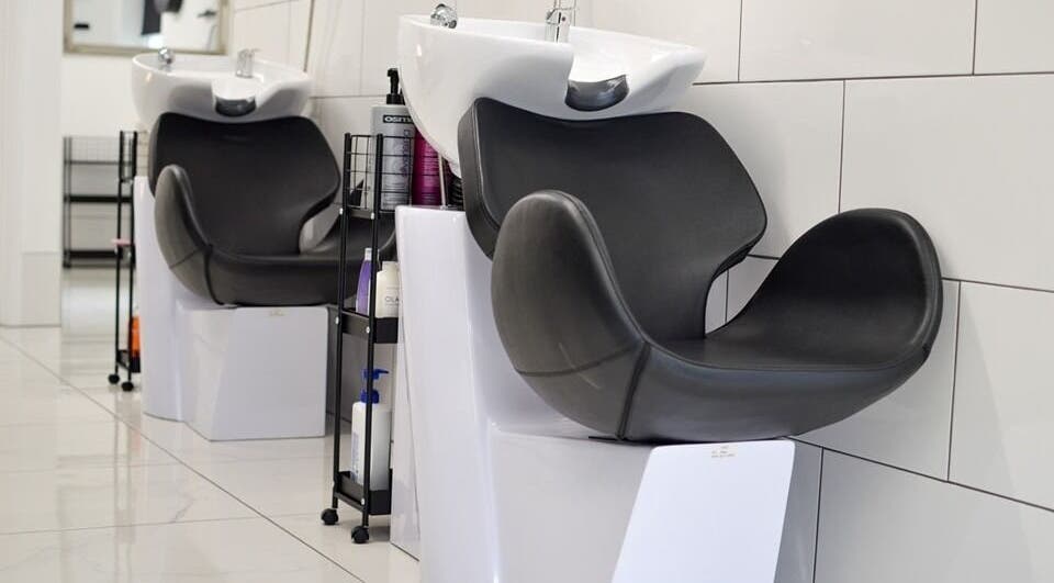 Modern hair wash stations at Perfected Hair and Beauty Studio, Berkeley, England, GB.