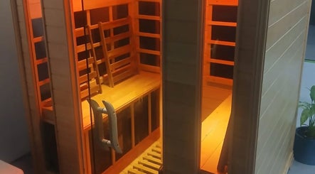 Warm wood sauna interior at The Grounding Room Sauna, Chatsworth, Queensland, AU.